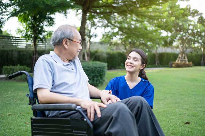 caucasian-caregiver-doctor-talk-with-older-disable-2021-12-09-02-48-54-utc.jpg