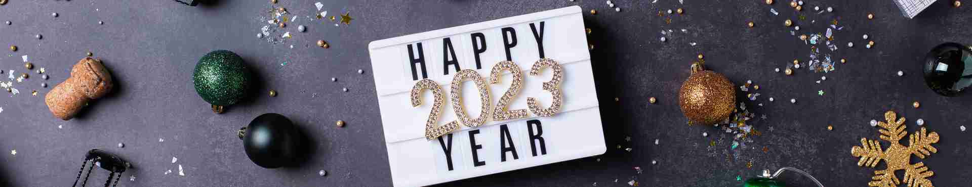 happy-new-year-greeting-card-2023-with-champagne-2022-10-17-22-44-20-utc.jpg