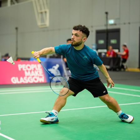 Charles Noakes playing badminton.