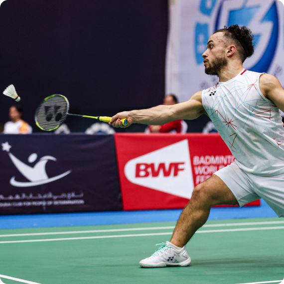 Charles Noakes playing badminton.