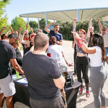 Members of the Staffmatch team celebrating winning an event during the annual seminar.