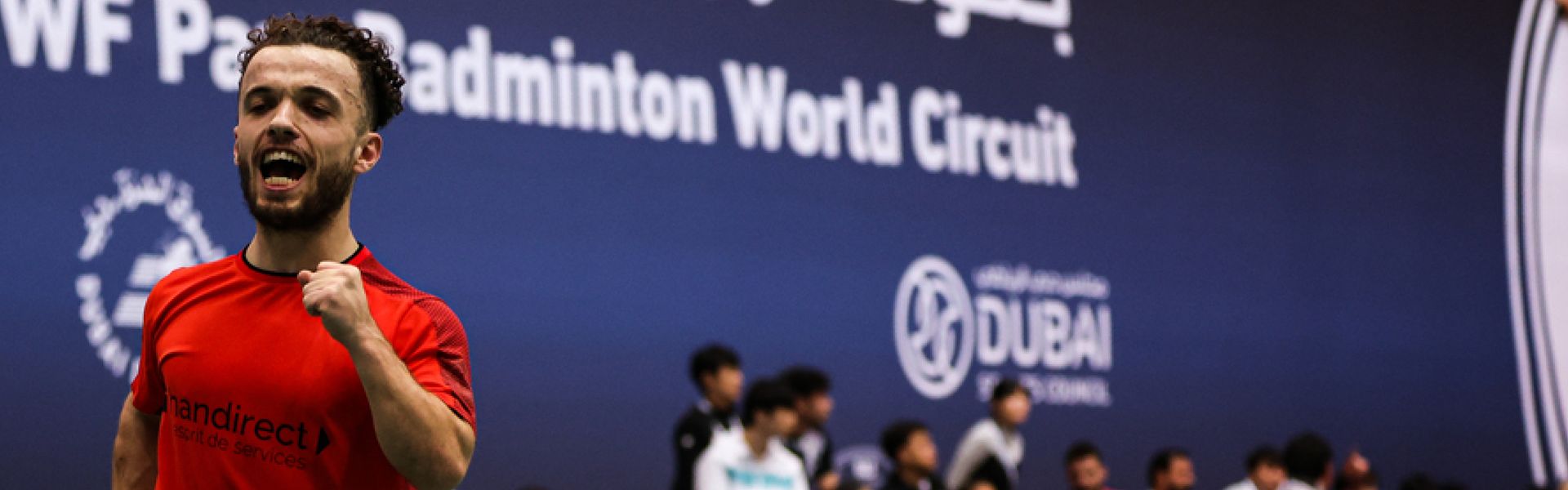 Charles Noakes celebrates winning a match at the Dubai Para Badminton Championships.