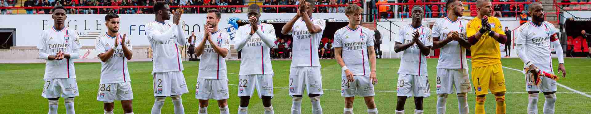 The OL team applauding its supporters.