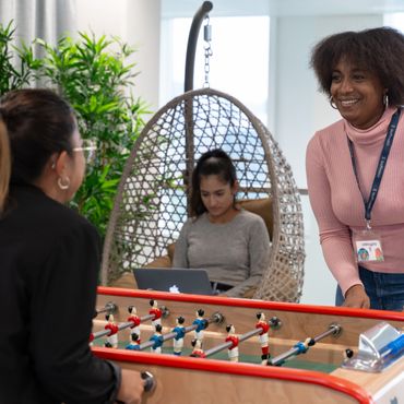 Members of the Staffmatch team competing at table football.